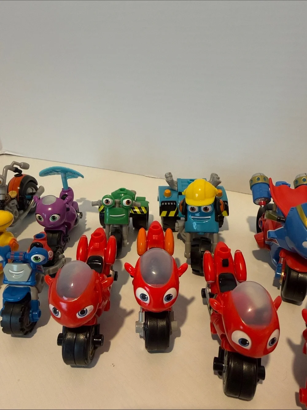 Ricky Zoom Kids Toy Motorbike Figures - Red, Blue, Yellow, Green (11 pieces)